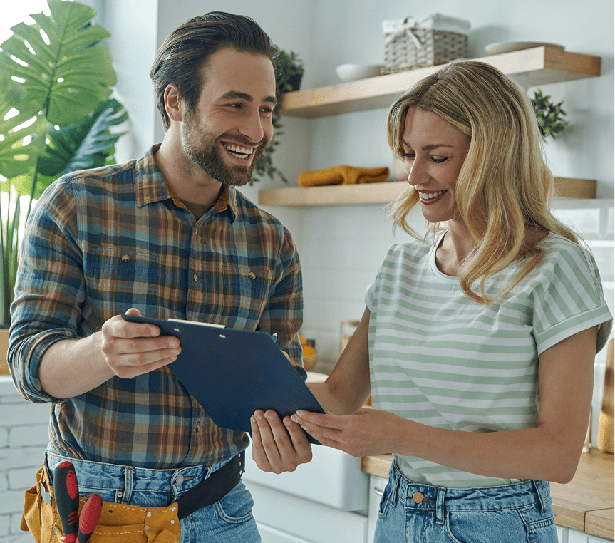 Smiling pair discussing home project